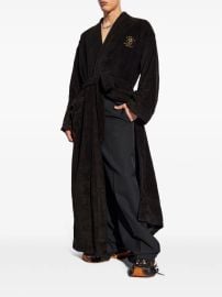 Balenciaga embroidered-logo Wrap Coat Black at Farfetch